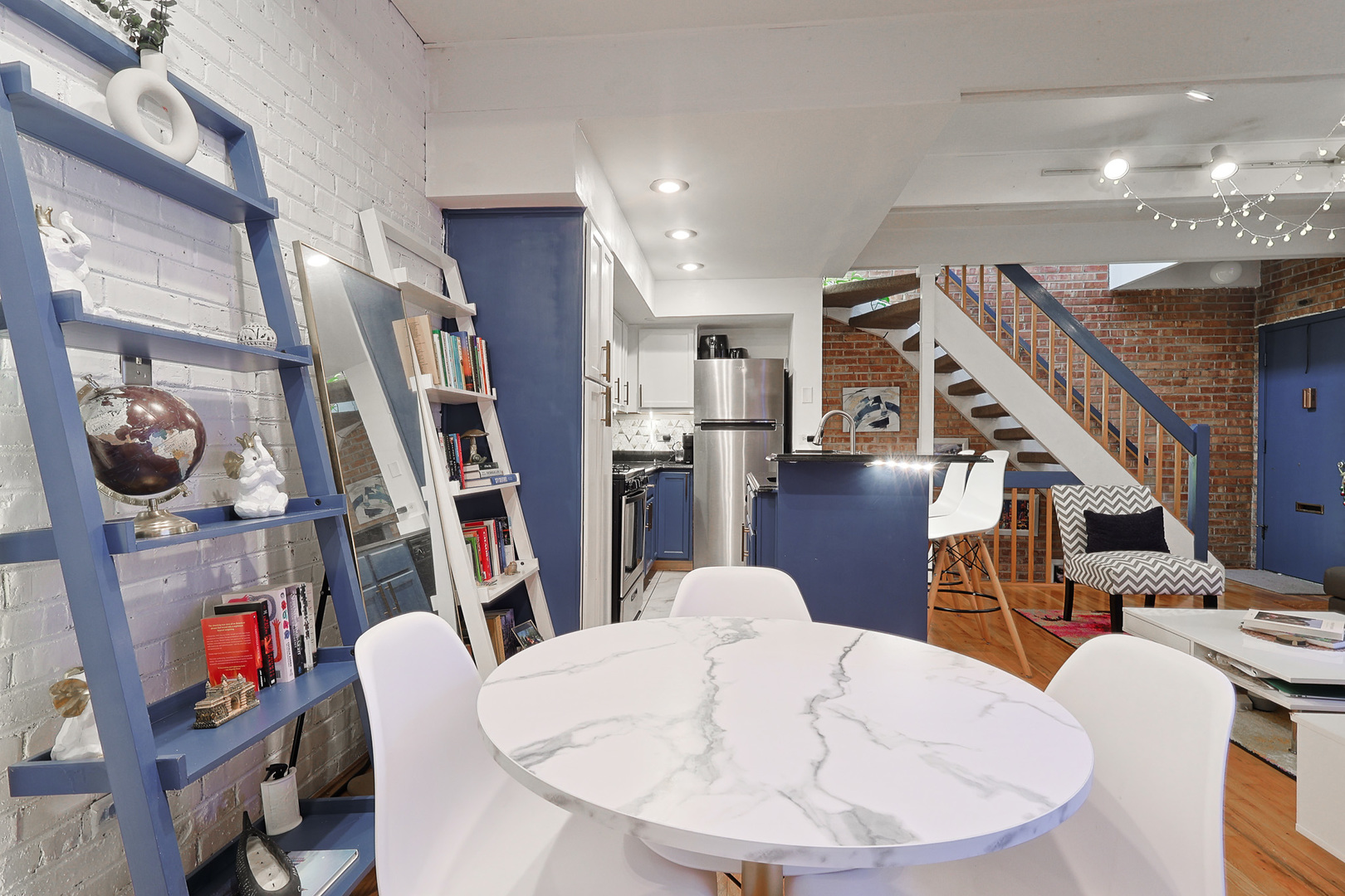 1630 North Sedgwick Street, Unit 2 Chicago, IL 60614 - Photo 9 of 28 a view of a dining room with furniture and wooden floor