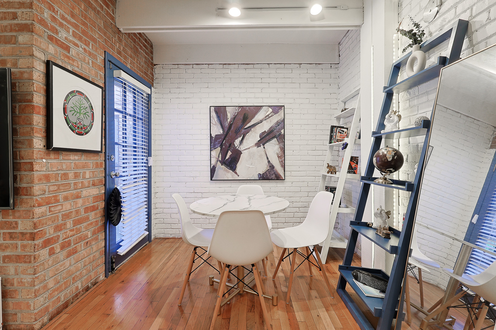 1630 North Sedgwick Street, Unit 2 Chicago, IL 60614 - Photo 10 of 28 a view of a brick wall with furniture and wooden floor