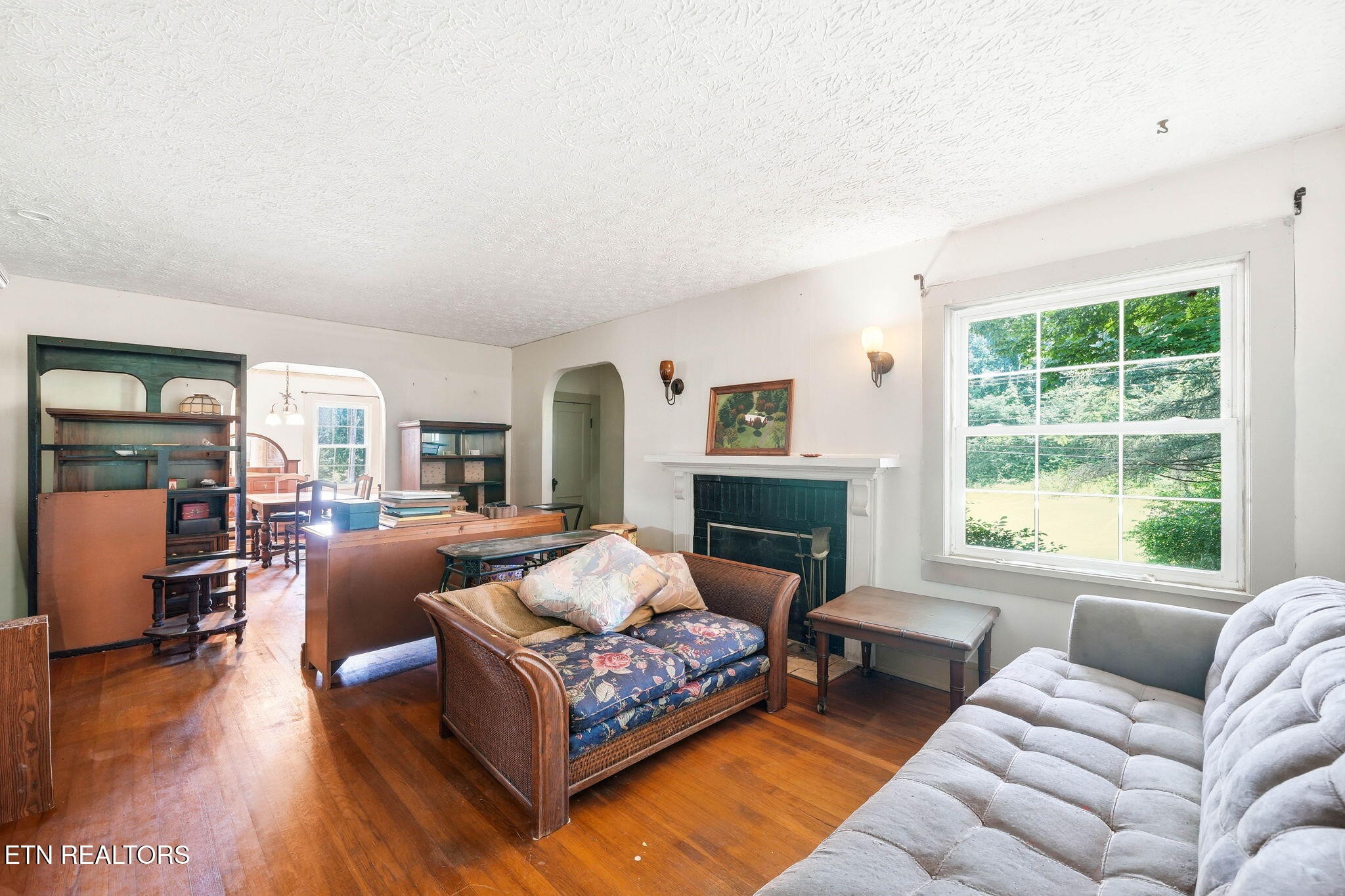 3992 Highway 92 Rutledge, TN 37861 - Photo 7 of 34 a living room with furniture large window and a fireplace