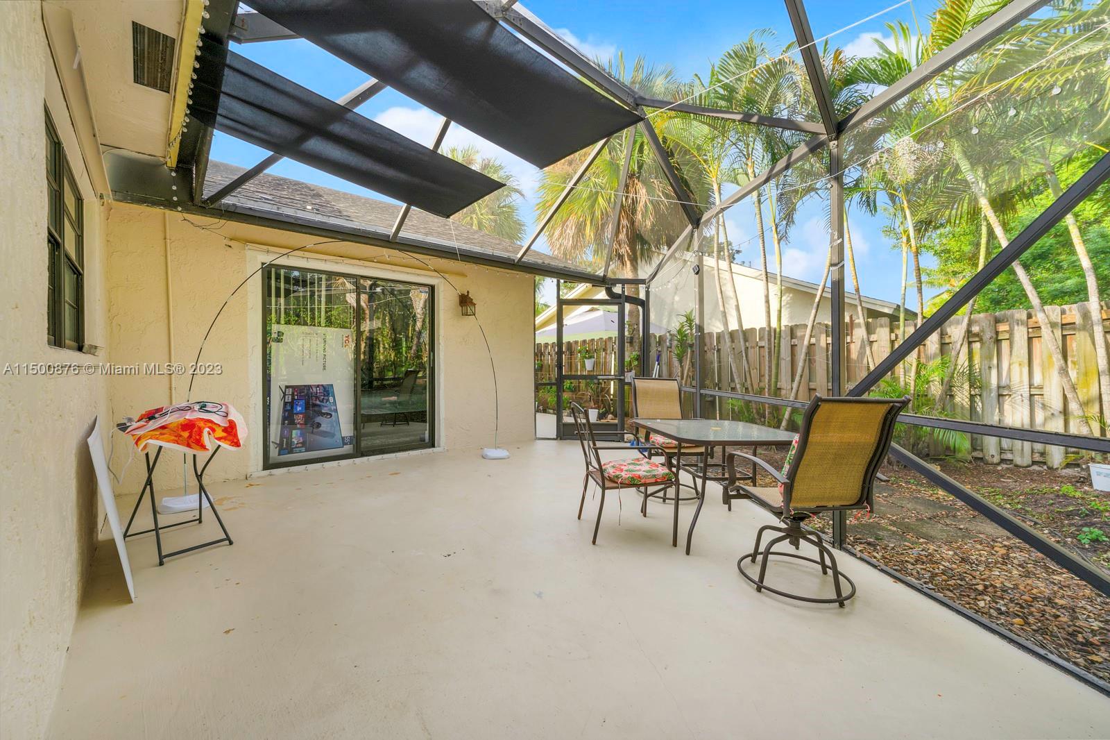 9883 Liberty Court Boca Raton, FL 33434 - Photo 26 of 29 a building outdoor space with seating