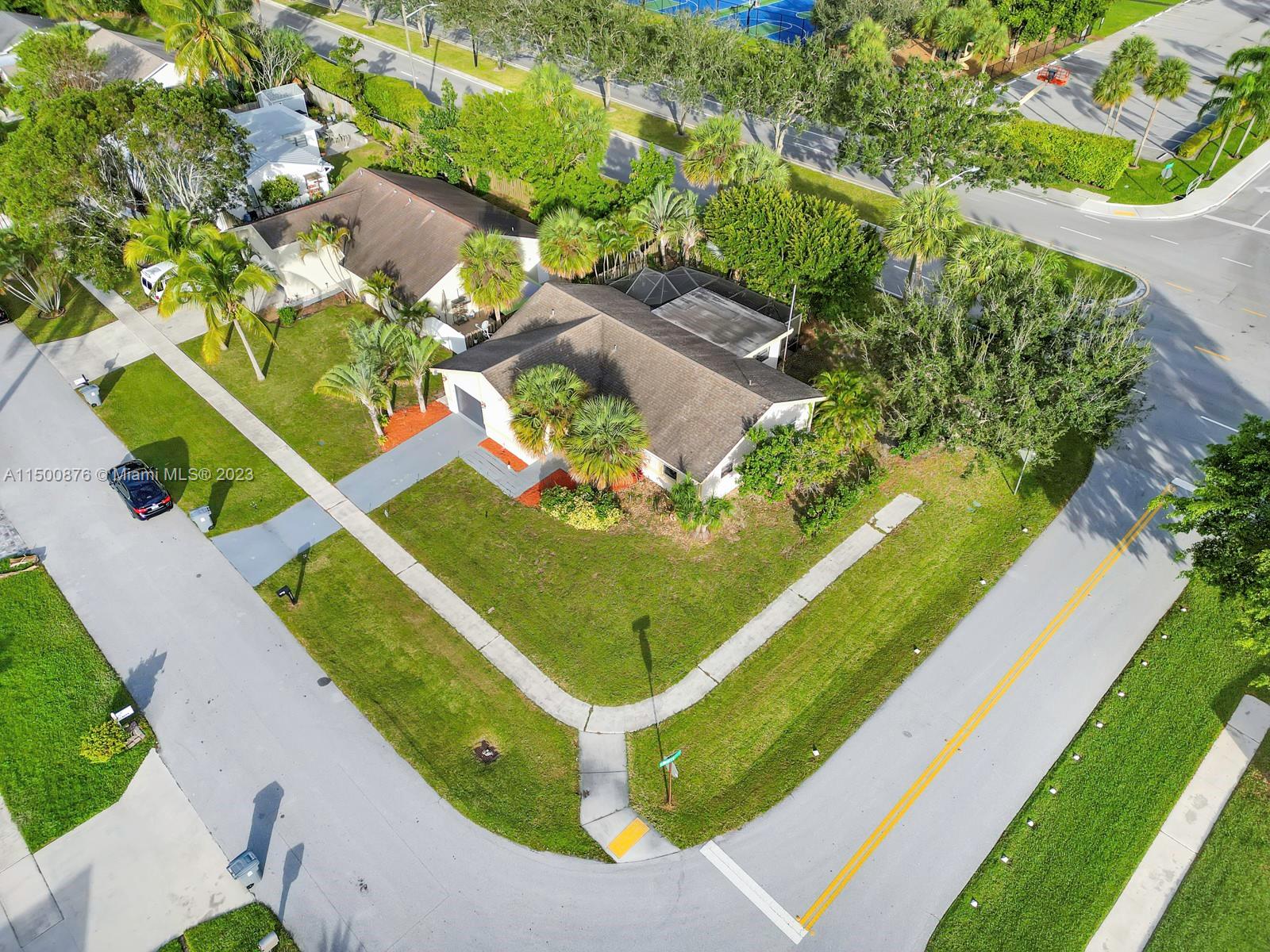 9883 Liberty Court Boca Raton, FL 33434 - Photo 3 of 29 an aerial view of a house