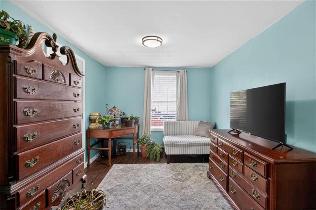 507 Grogan Road Buchanan, GA 30113 - Photo 18 of 31 a living room with furniture and a flat screen tv