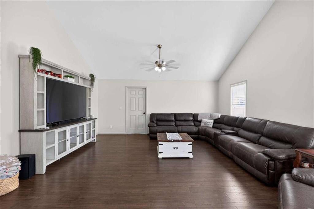507 Grogan Road Buchanan, GA 30113 - Photo 7 of 31 a living room with furniture and a flat screen tv