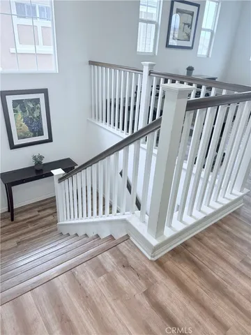 a view of entryway with wooden floor