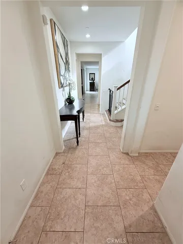 a living room with a furniture and a window