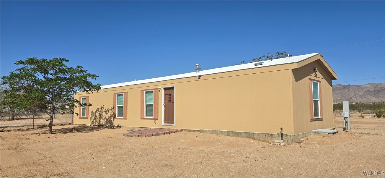 3675 Amado Road Golden Valley, AZ 86413 - Photo 1 of 35 a view of a house with a outdoor space