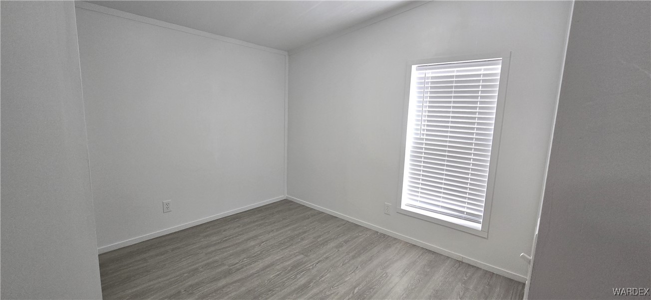 3675 Amado Road Golden Valley, AZ 86413 - Photo 23 of 35 a view of a room that has a window in it