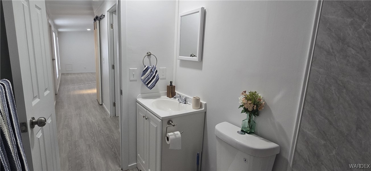 3675 Amado Road Golden Valley, AZ 86413 - Photo 26 of 35 a bathroom with a sink toilet and shower