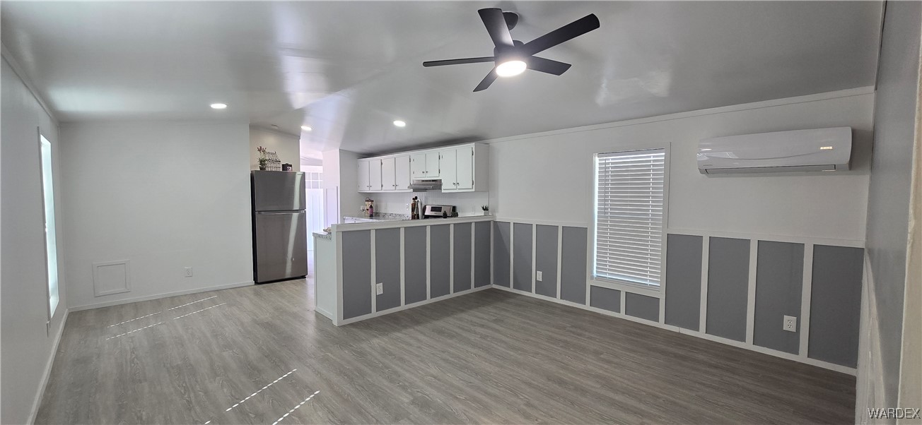 3675 Amado Road Golden Valley, AZ 86413 - Photo 6 of 35 a view of a hallway with wooden floor and entryway