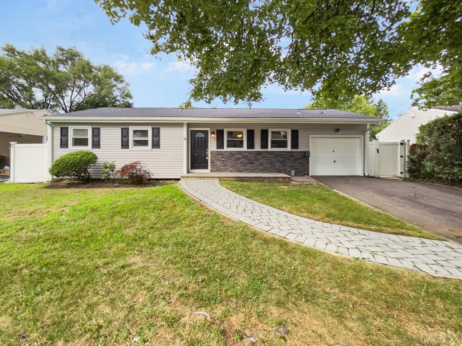 19 Clemson Road Old Bridge, NJ 08859 - Photo 1 of 23 a front view of a house with yard and green space