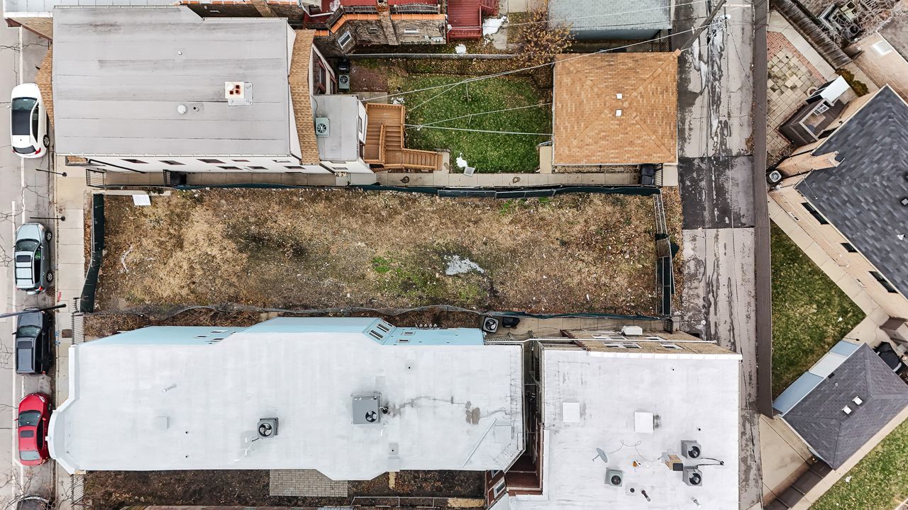 3675 North Elston Avenue Chicago, IL 60618 - Photo 2 of 19 a bathroom with a sink and a mirror