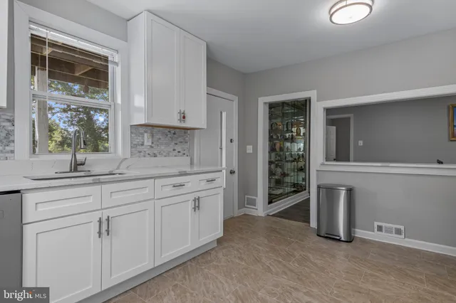 a living room with furniture and window