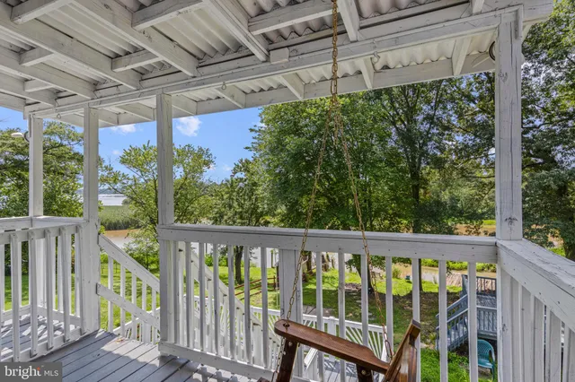 a view of a hallway with a white walls