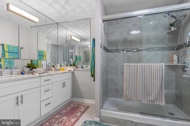 a view of a wooden deck with a yard