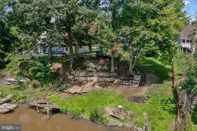 a view of a lake with outdoor space and street view