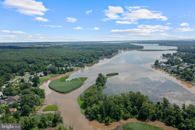 an aerial view of a house with outdoor space