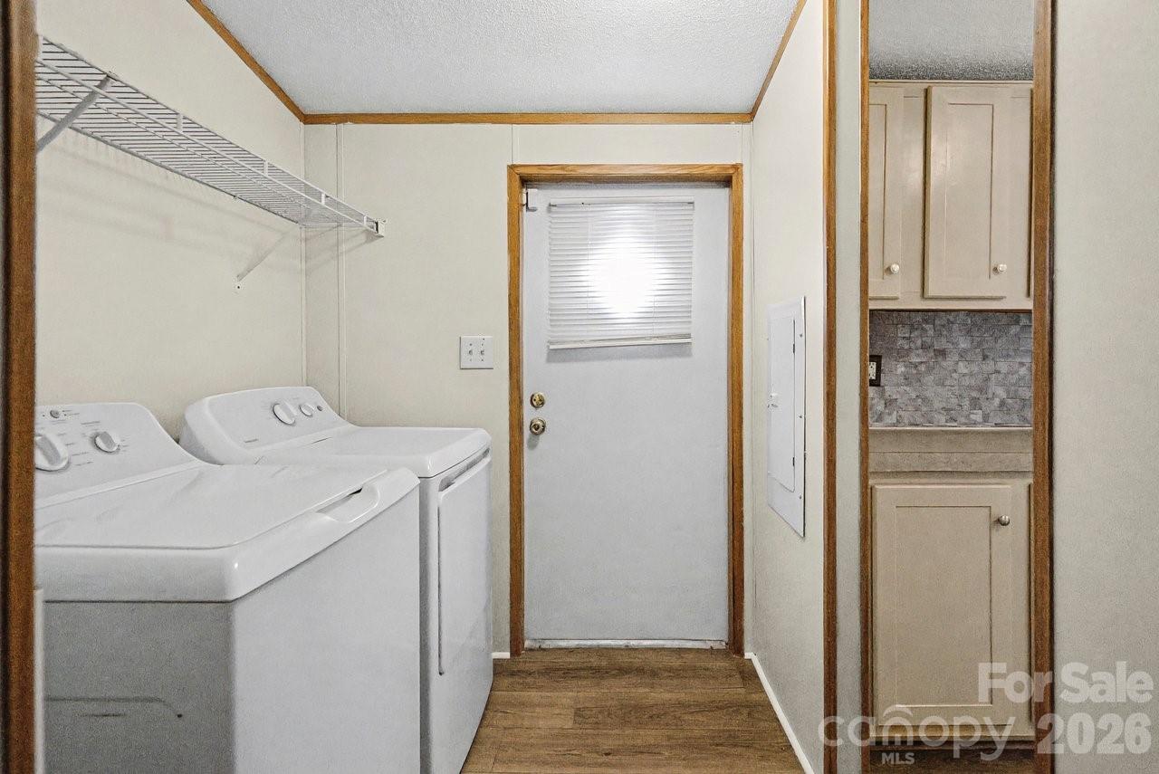 40348 Barnhardt Road New London, NC 28127 - Photo 32 of 38 a utility room with dryer and washer