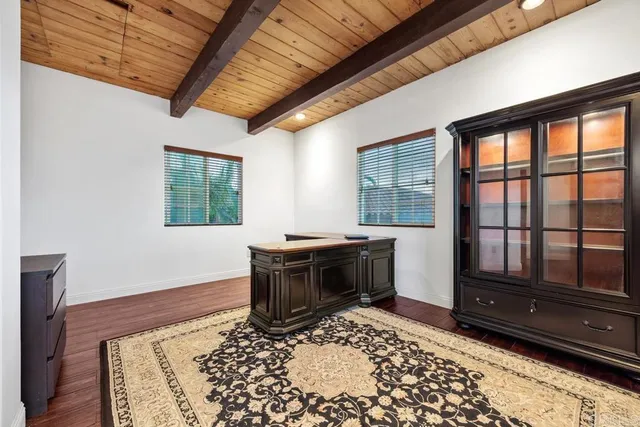 a room with a bed and a window