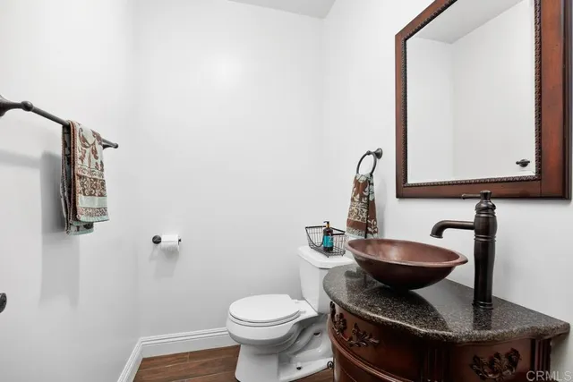 a bathroom with a toilet and sink