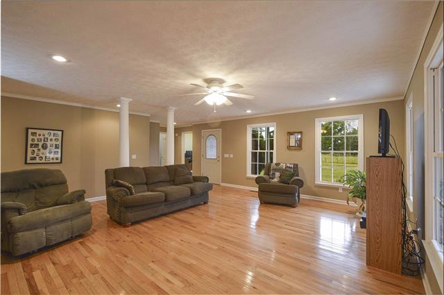 272 Revilo Road Leoma, TN 38468 - Photo 4 of 20 a living room with furniture and a large window