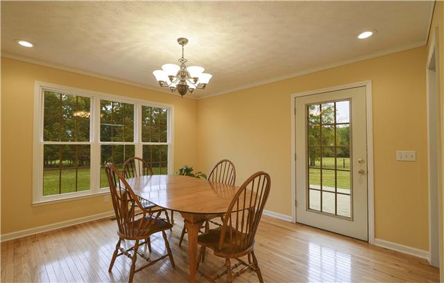 272 Revilo Road Leoma, TN 38468 - Photo 10 of 20 a view of a dining room with furniture window and wooden floor