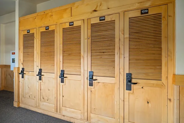 a view of a balcony with a table and chairs