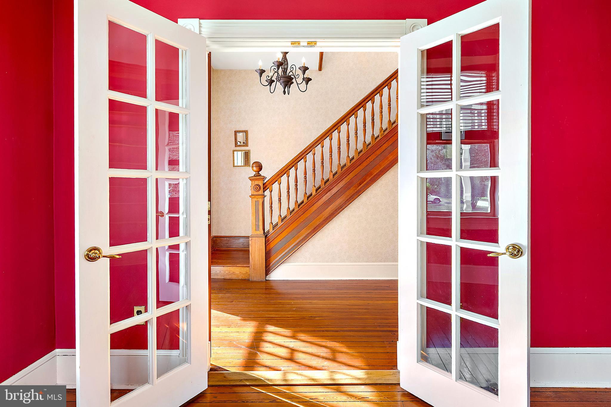 26090 Royal Oak Road Easton, MD 21601 - Photo 12 of 74 a view of balcony with wooden floor and windows