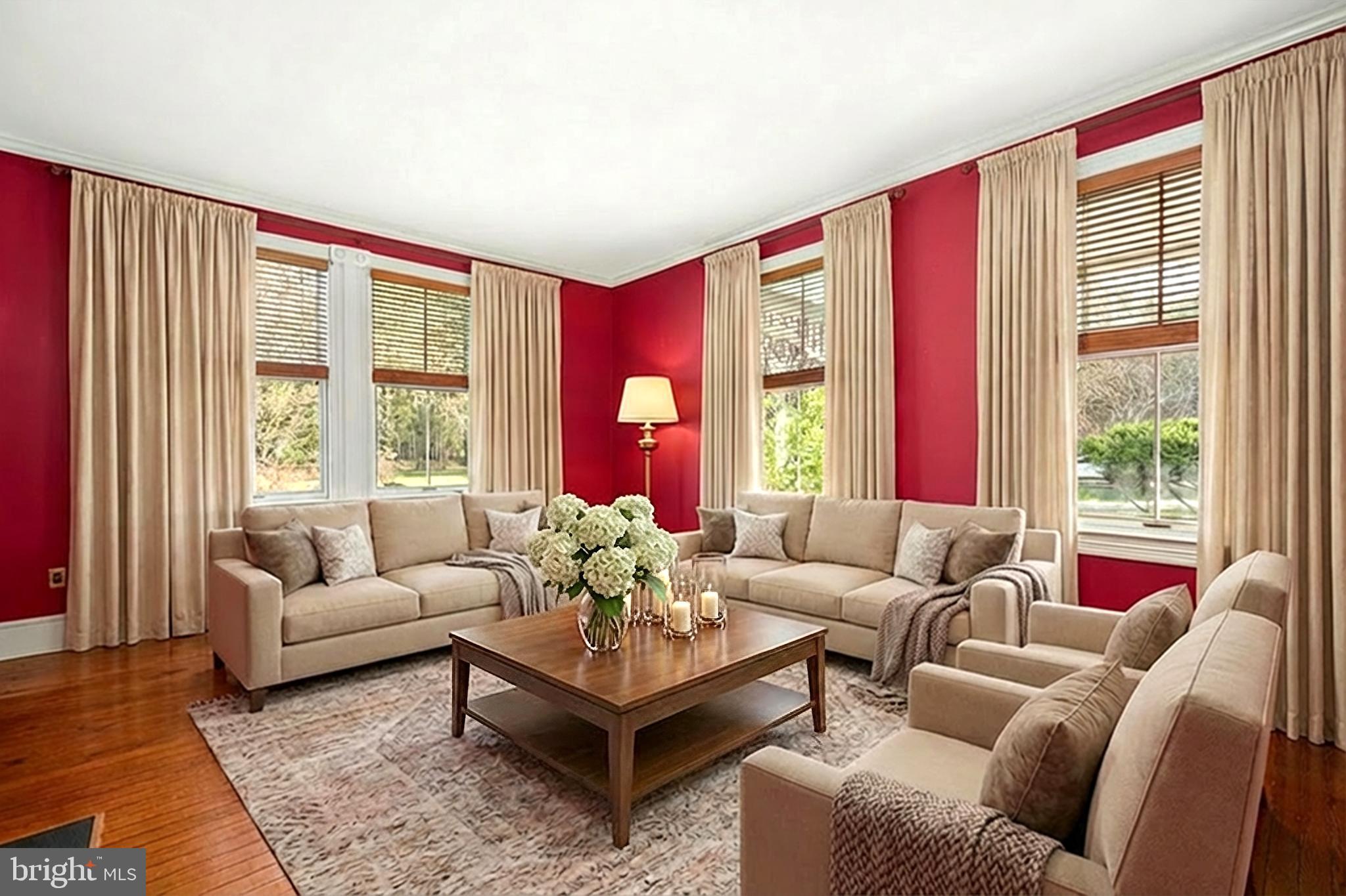 26090 Royal Oak Road Easton, MD 21601 - Photo 14 of 74 a living room with furniture and a large window