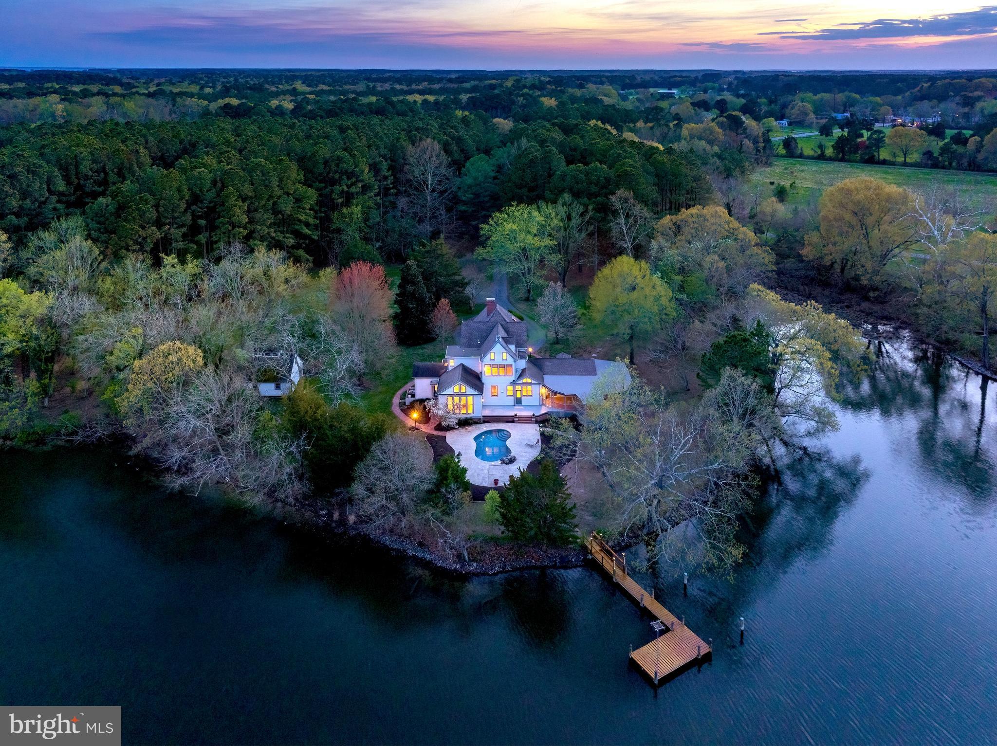 26090 Royal Oak Road Easton, MD 21601 - Photo 3 of 74 an aerial view of a house with a garden