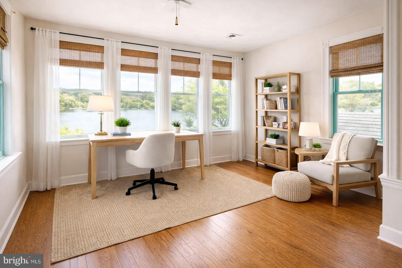 26090 Royal Oak Road Easton, MD 21601 - Photo 31 of 74 a living room with furniture and a large window