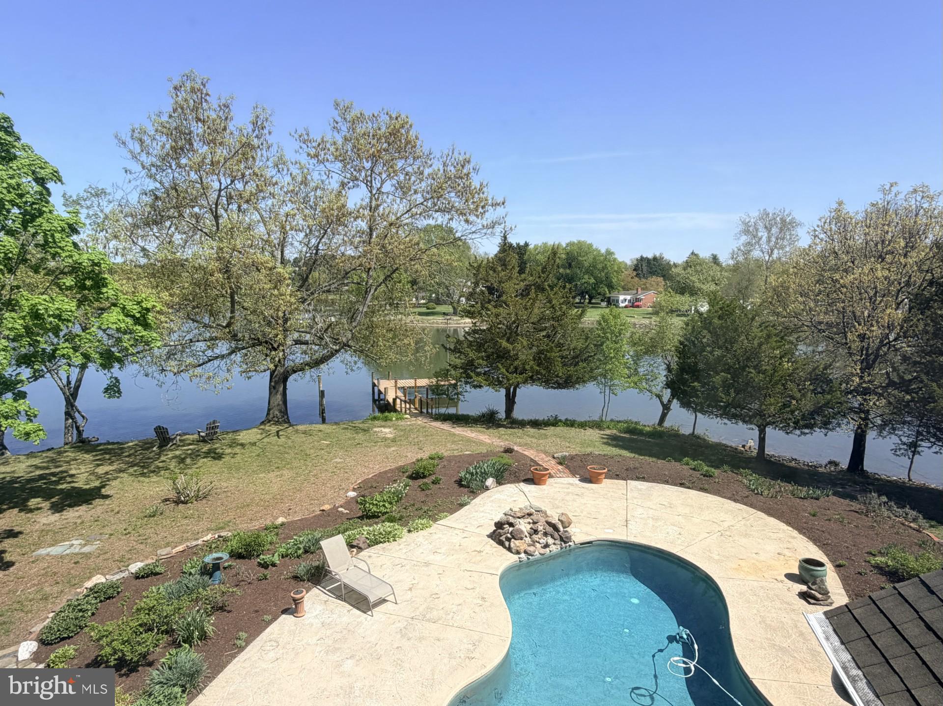 26090 Royal Oak Road Easton, MD 21601 - Photo 33 of 74 a view of a backyard with a fountain