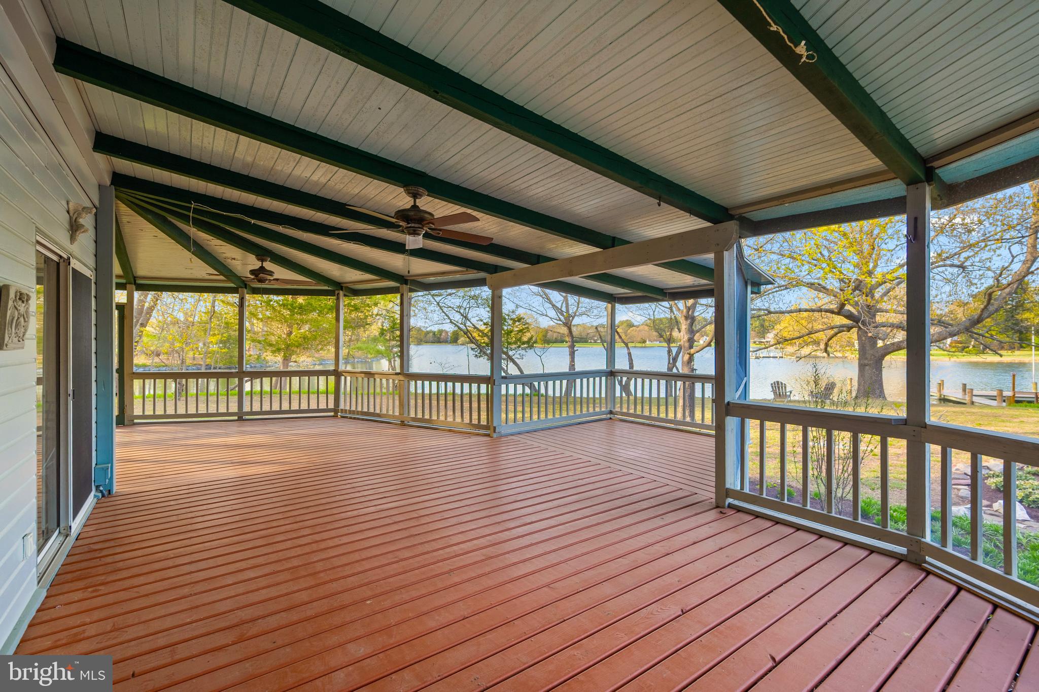 26090 Royal Oak Road Easton, MD 21601 - Photo 49 of 74 Magnificent wraparound screened porch