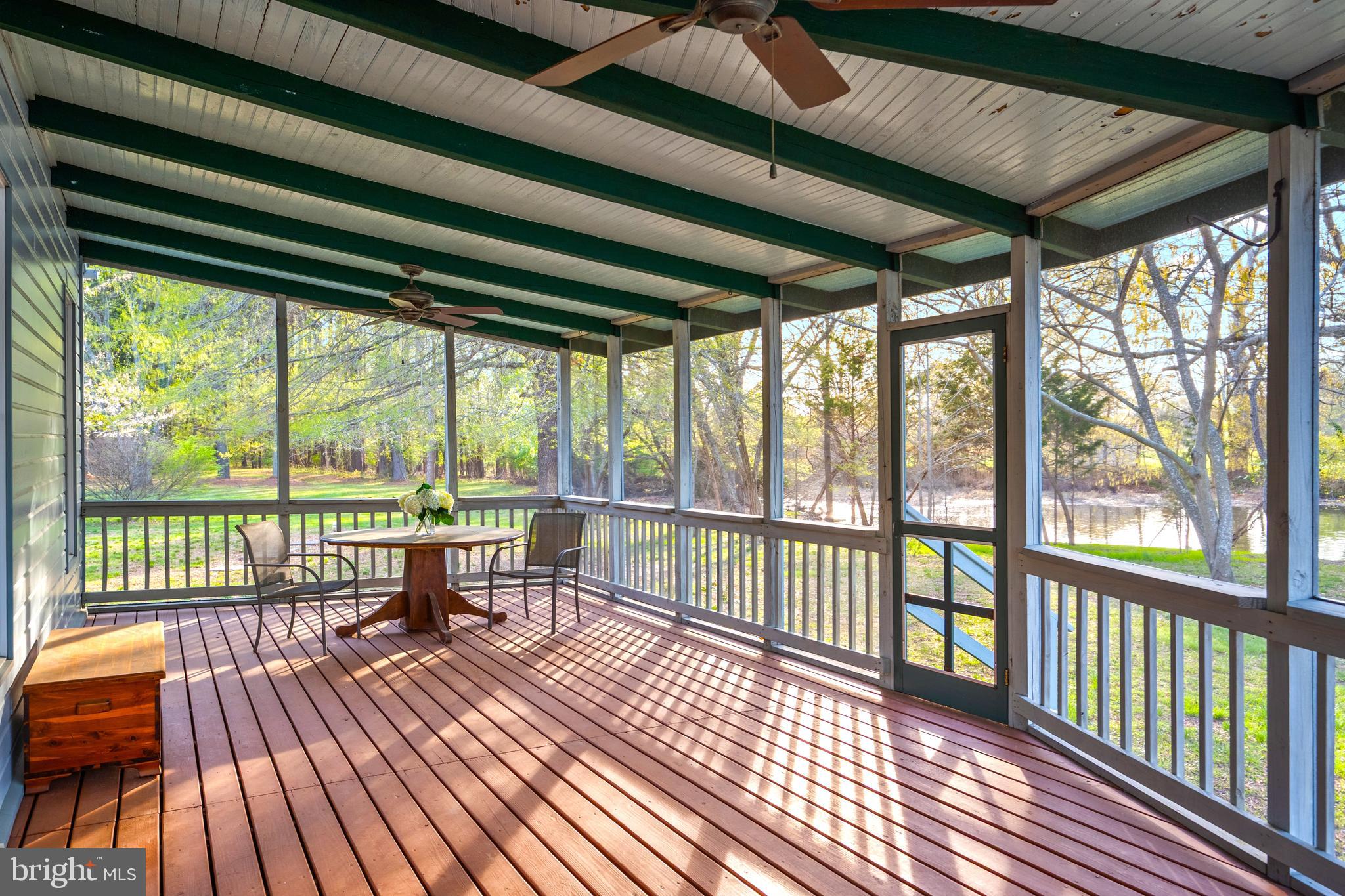 26090 Royal Oak Road Easton, MD 21601 - Photo 50 of 74 a view of a balcony with wooden floor