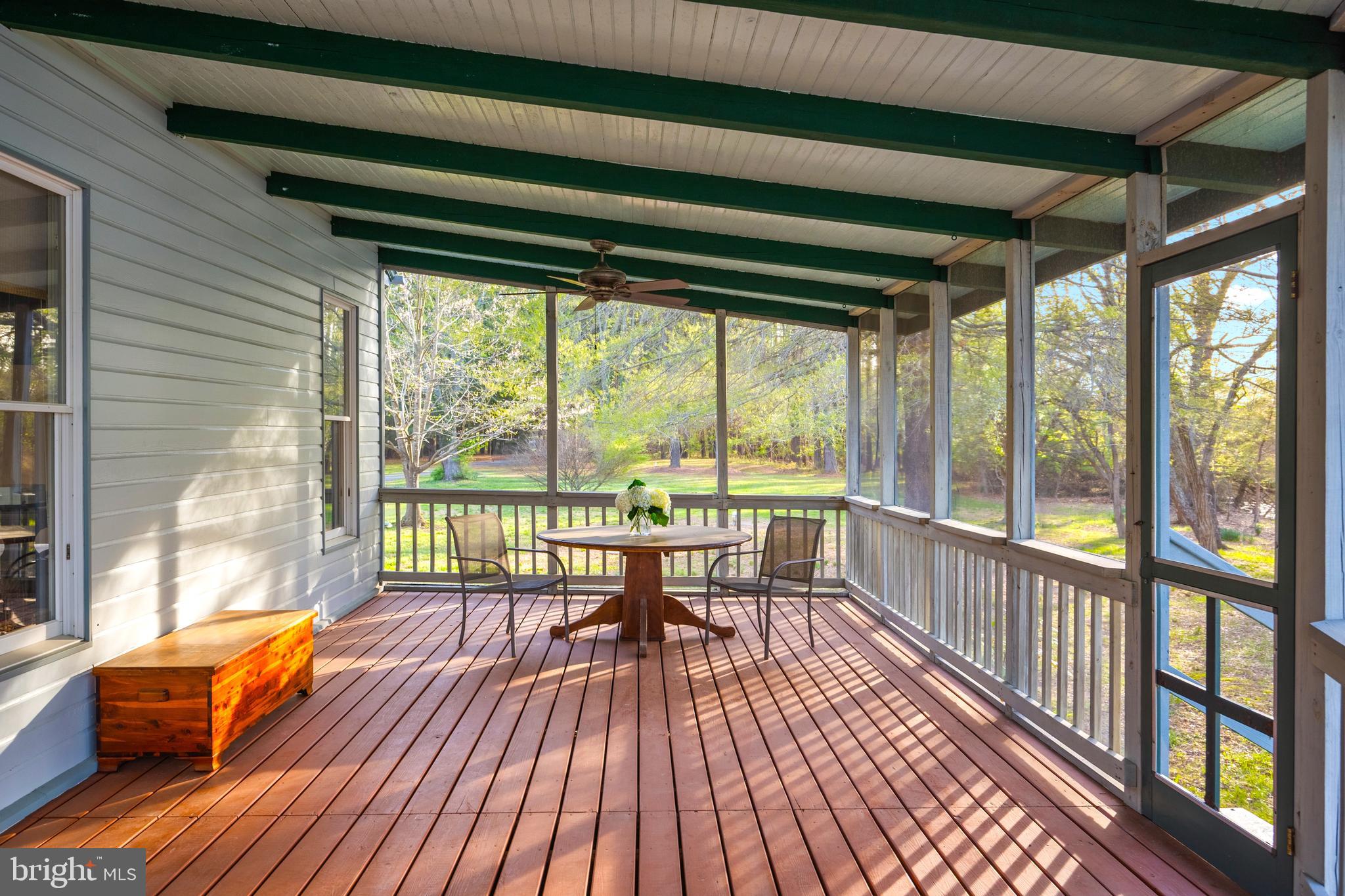 26090 Royal Oak Road Easton, MD 21601 - Photo 51 of 74 a view of a room with wooden floor and furniture