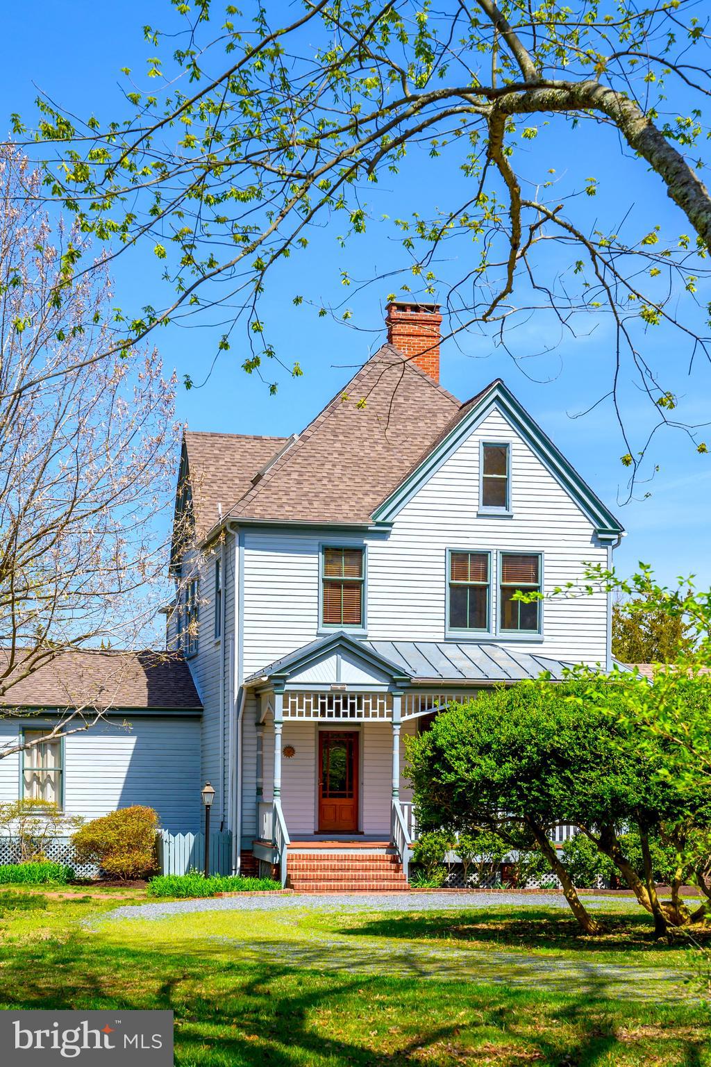 26090 Royal Oak Road Easton, MD 21601 - Photo 57 of 74 a front view of a house with a yard