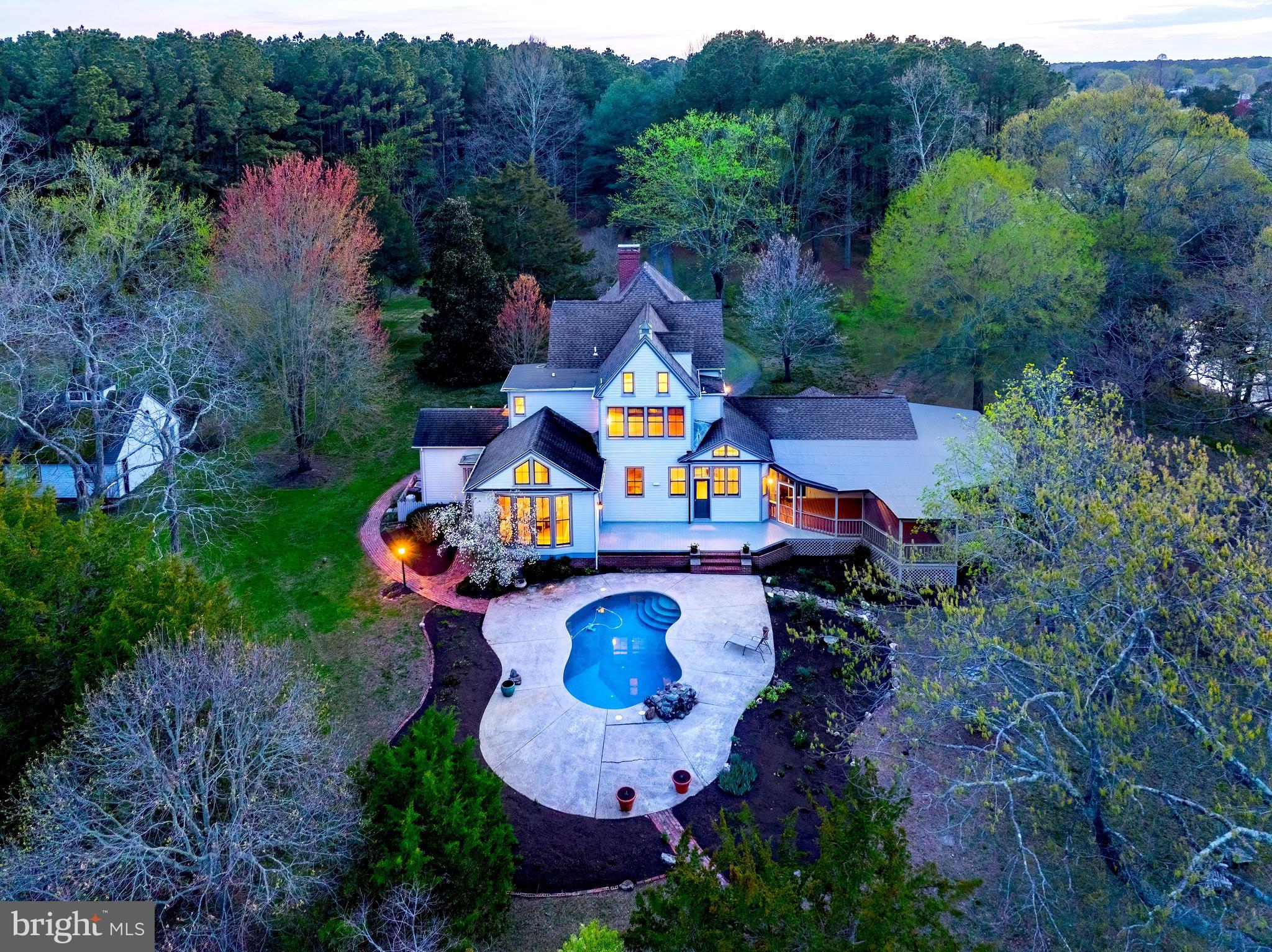 26090 Royal Oak Road Easton, MD 21601 - Photo 63 of 74 an aerial view of a house with outdoor space pool seating area and yard