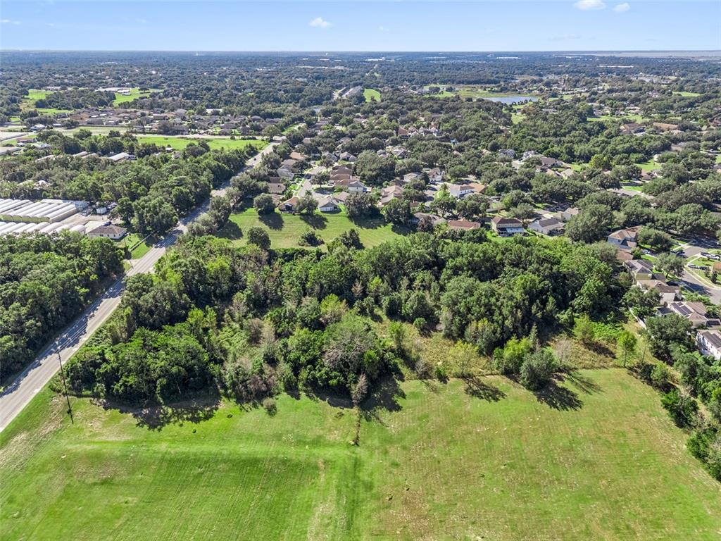 2228 Vick Road Apopka, FL 32712 - Photo 19 of 26 a view of a green field