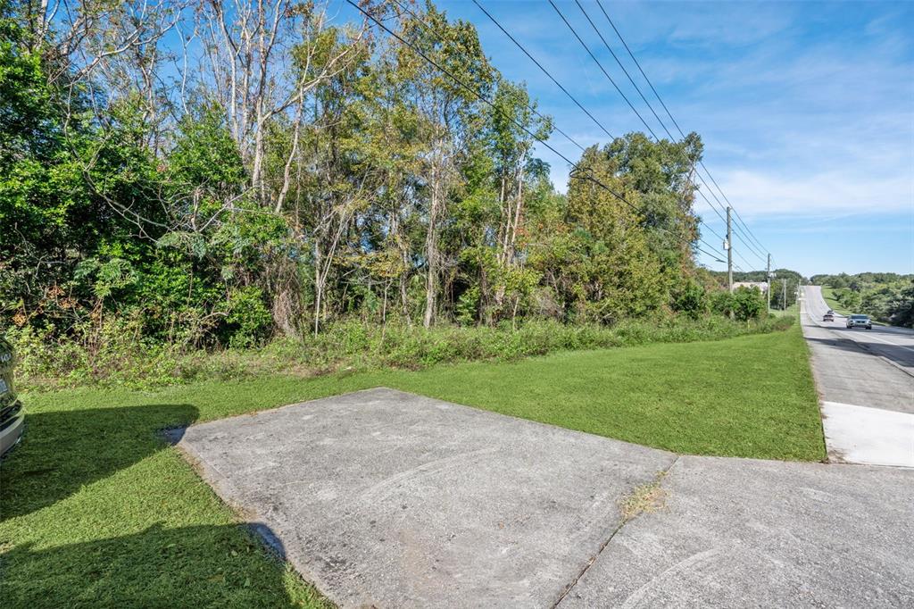 2228 Vick Road Apopka, FL 32712 - Photo 26 of 26 a view of a park with plants and trees