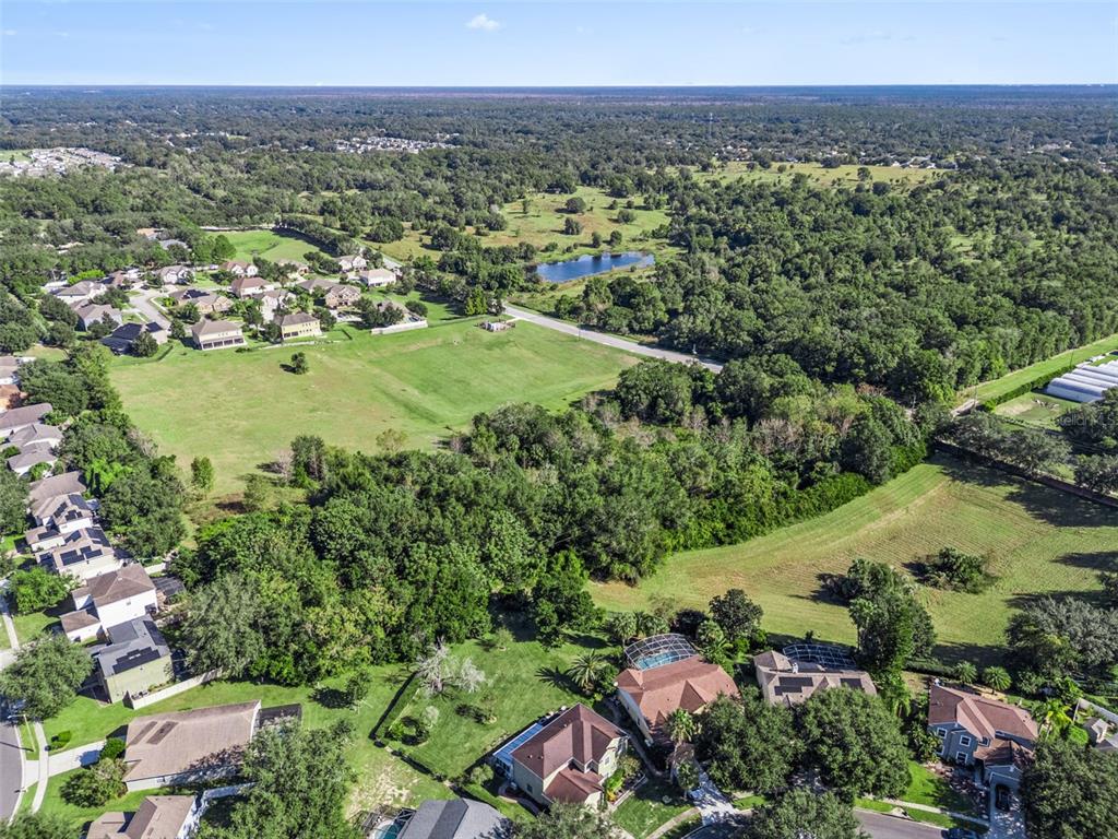 2228 Vick Road Apopka, FL 32712 - Photo 10 of 26 an aerial view of a houses with a yard