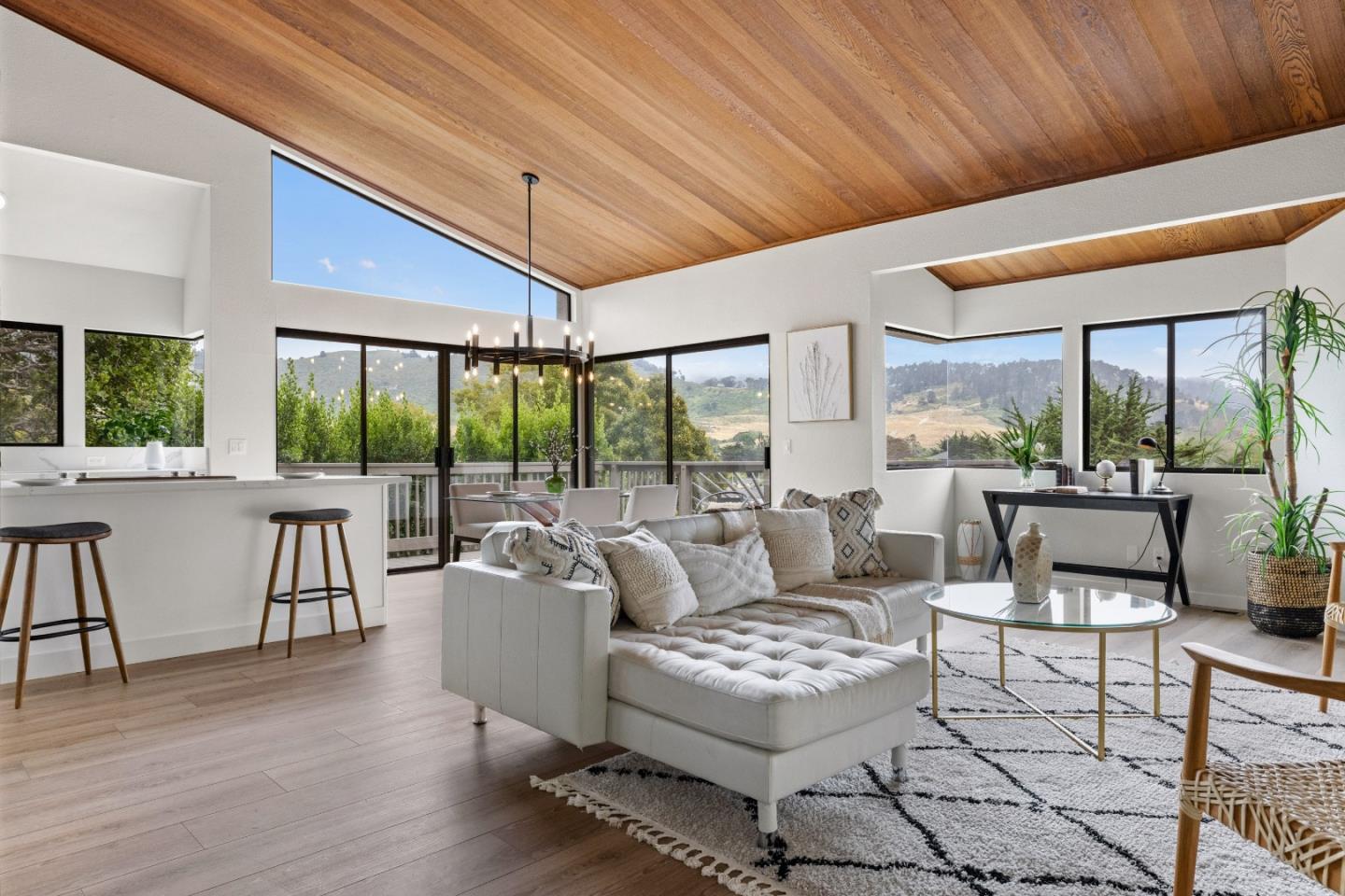 3465 Rio Road Carmel, CA 93923 - Photo 1 of 28 a living room with furniture and a large window