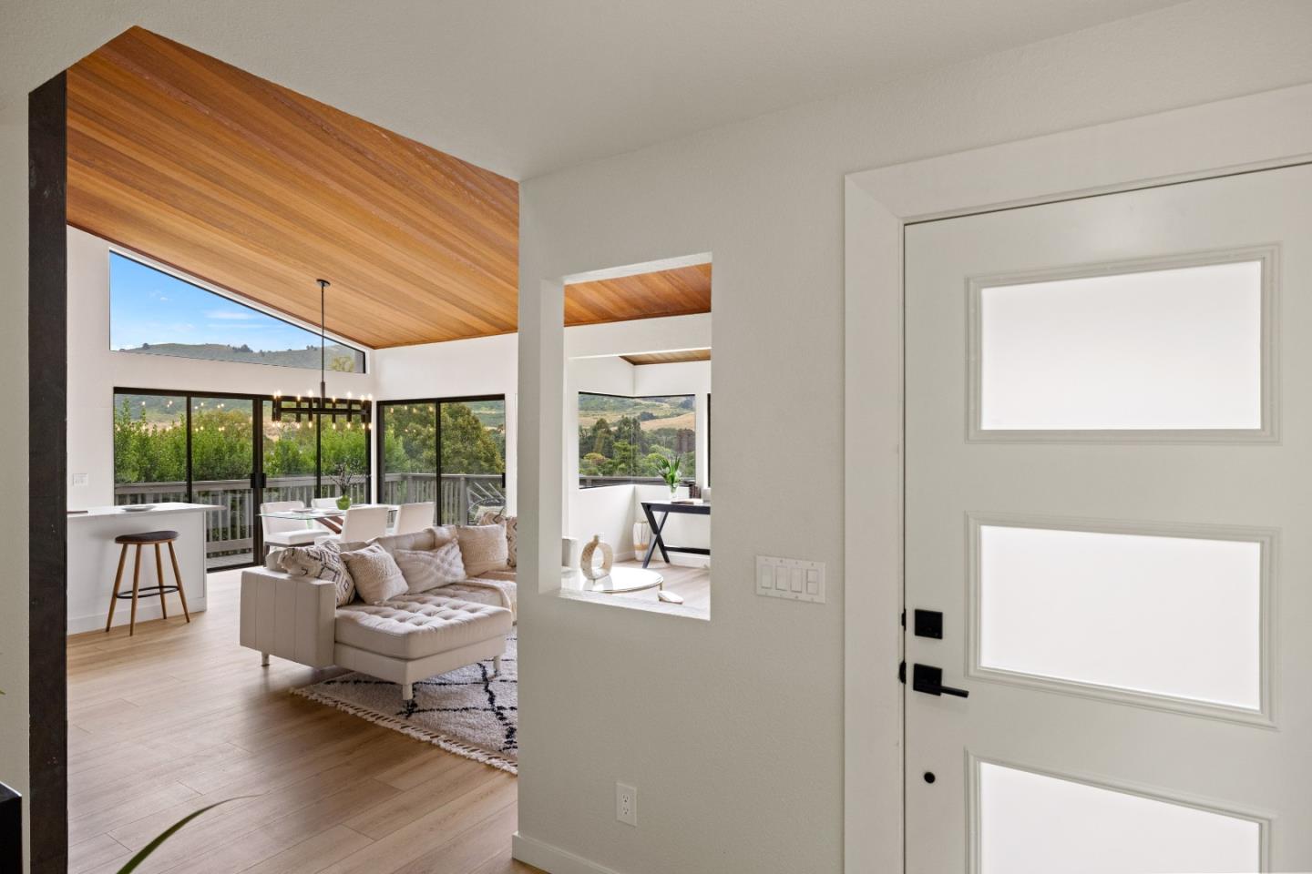 3465 Rio Road Carmel, CA 93923 - Photo 3 of 28 a living room with furniture and a large window