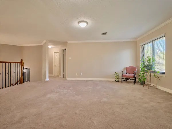 a view of a livingroom with furniture and cabinet