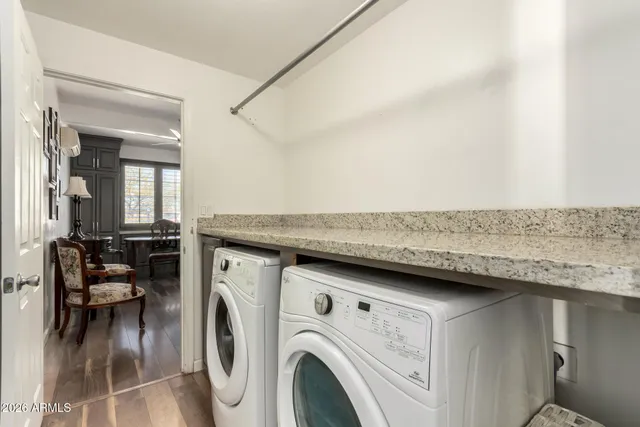 a utility room with washer and dryer