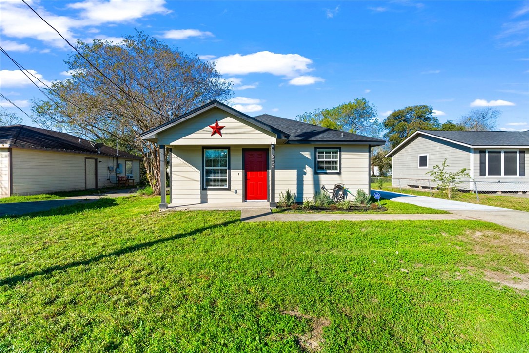 804 Ave B Street Sinton, TX 78387 - Photo 37 of 40 a front view of a house with garden