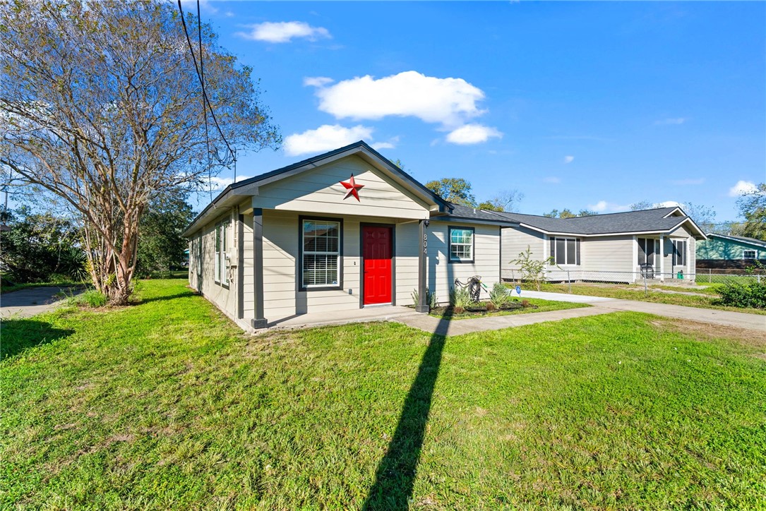 804 Ave B Street Sinton, TX 78387 - Photo 38 of 40 a front view of a house with yard and green space