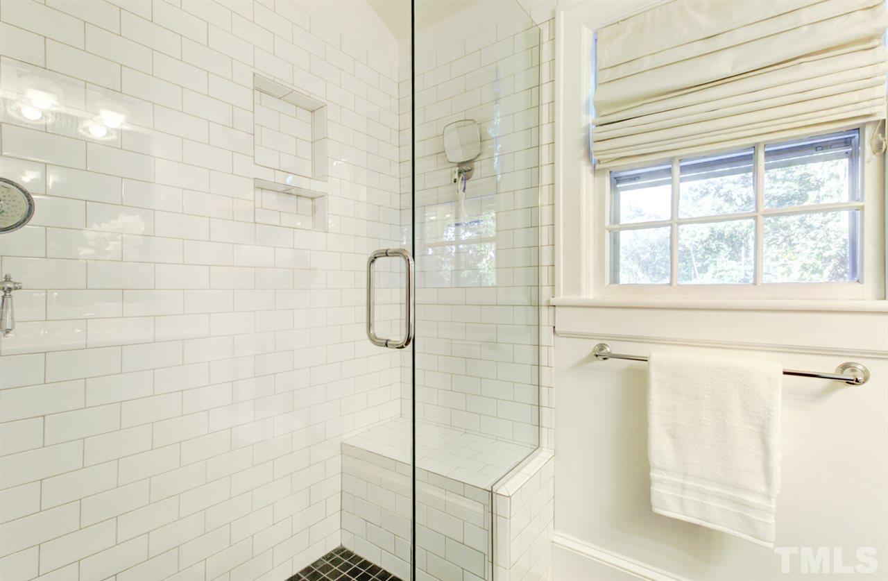 413 Dixie Trail Raleigh, NC 27607 - Photo 22 of 30 a bathroom with a shower