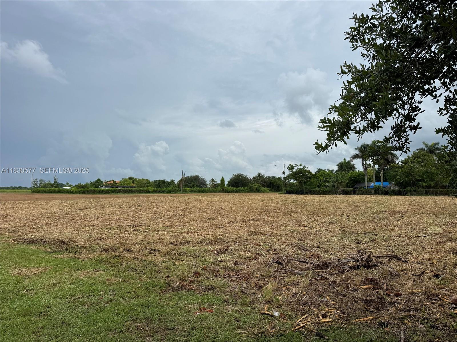 20800 Southwest 242nd Street Homestead, FL 33031 - Photo 4 of 5 a view of lake and mountain view