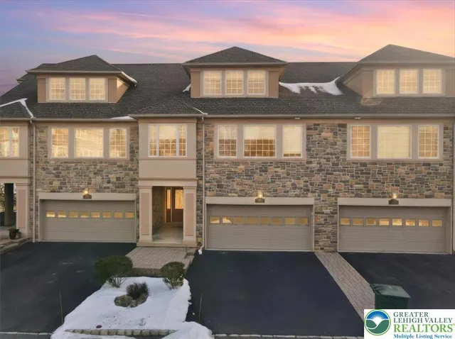 a view of a porch with a table and chair