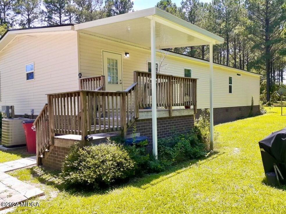 1179 Union Church Road Fort Valley, GA 31030 - Photo 3 of 20 a front view of a house having yard