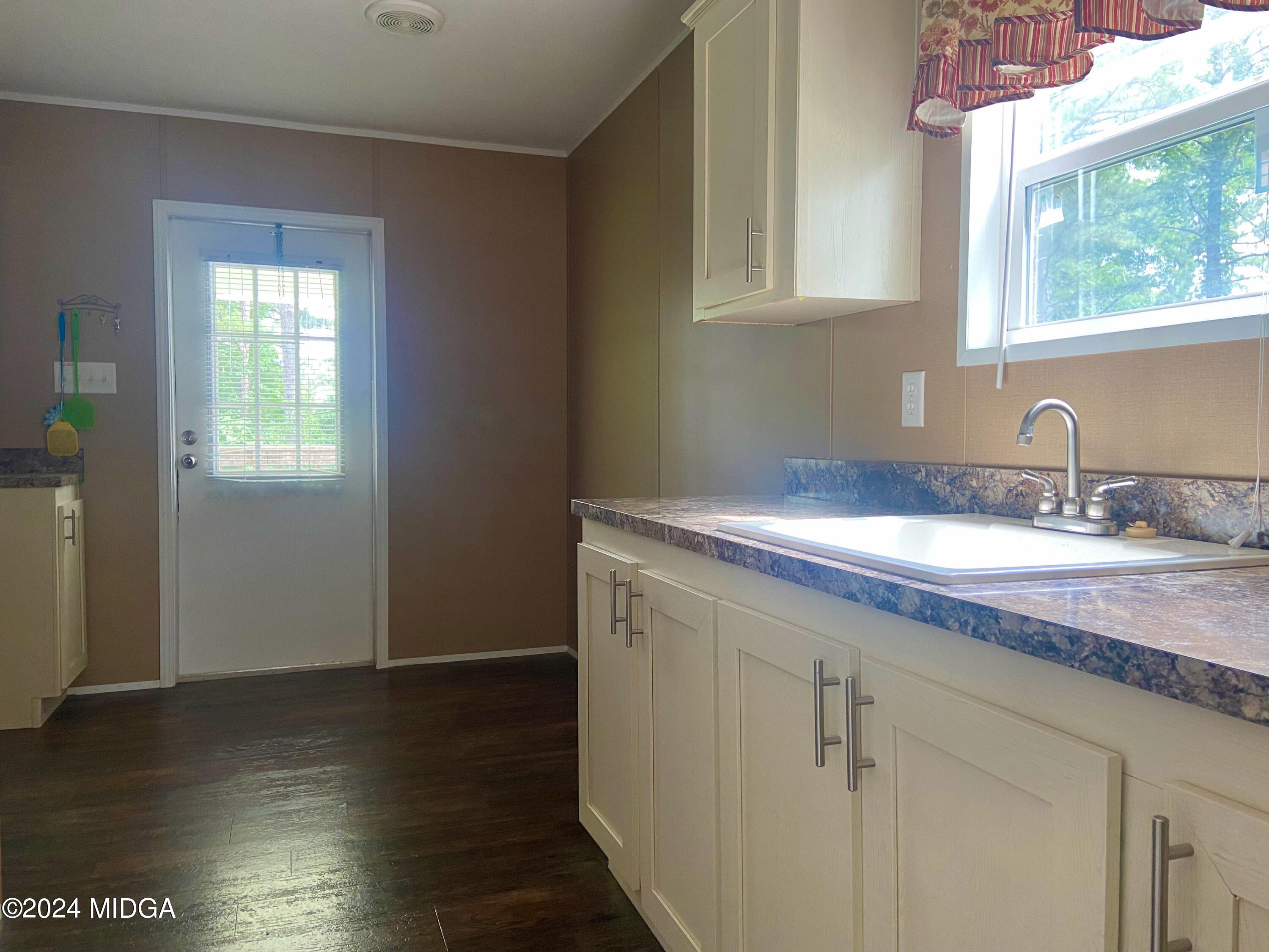 1179 Union Church Road Fort Valley, GA 31030 - Photo 6 of 20 a bathroom with a sink and a window